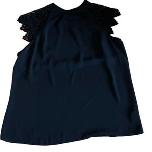 Black express top with lace sleeves and back cut out